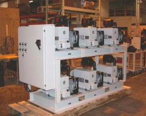 Industrial vacuum systems for roughing and backing high vacuum pumps